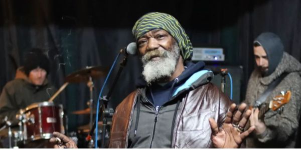 Tomlin Mystic, aka Tomlin "Mystic" Taylor, is a seasoned reggae vocalist who began his journey in the 80s with "Natural Mystique." 