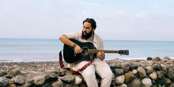 Iotosh's latest single, "Bad News," takes a heartfelt look at grief and the pain of losing someone close. Reggae Tastemaker